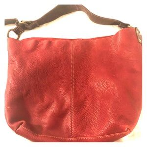 Genuine leather red one-strap with snap closure